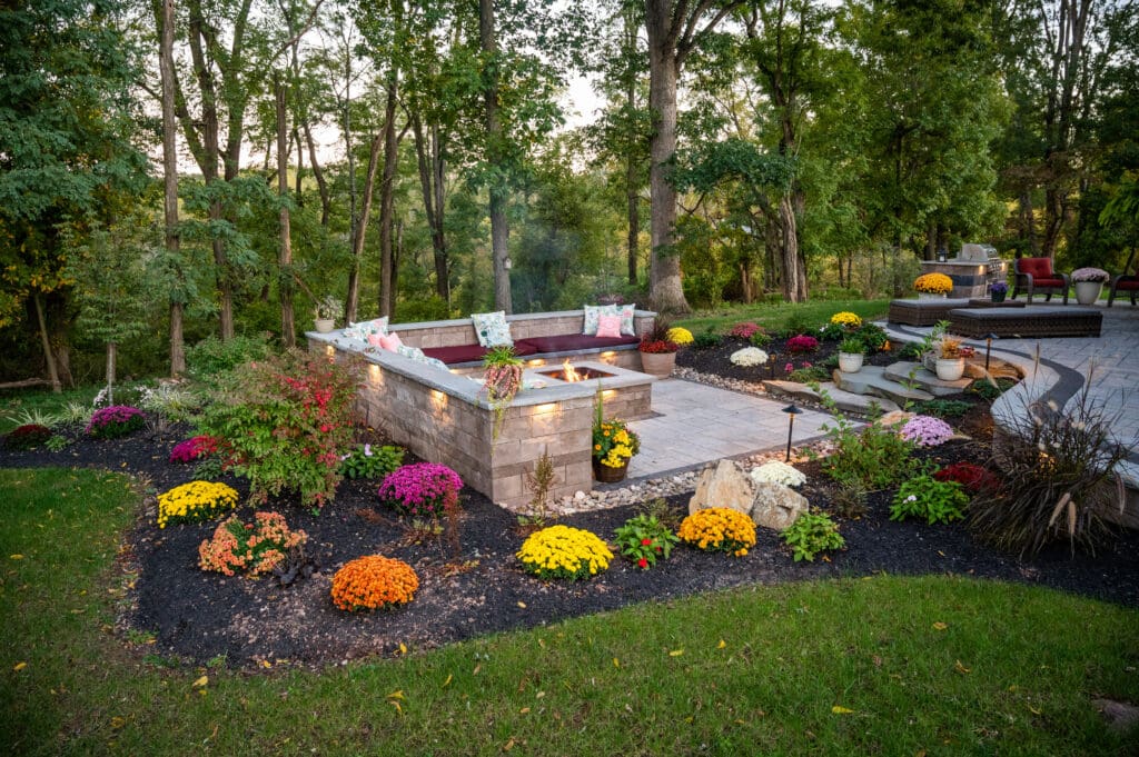 Landscape designer planting a garden bed